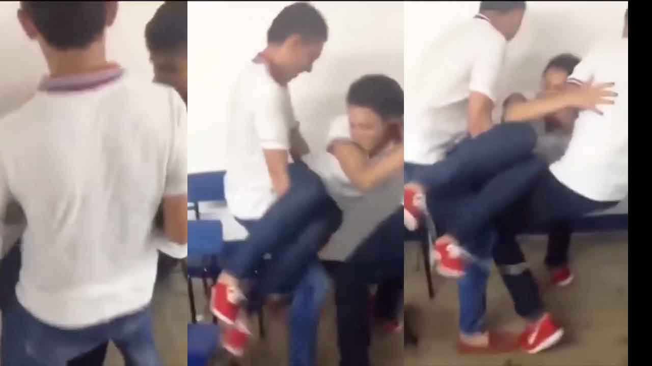 Schoolgirl screams for them to stop, while her friends pretend to be having sex with her.