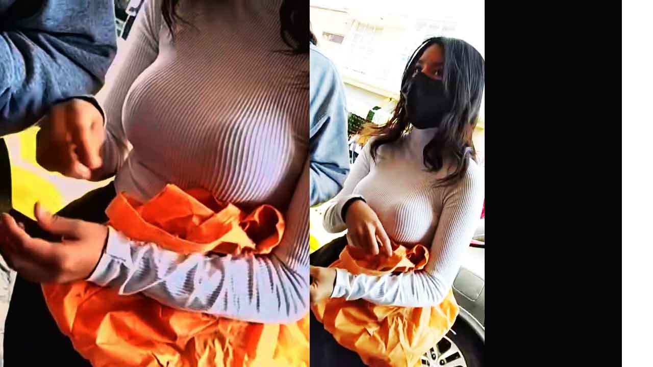 A Latina teenager forgets to wear a bra, and her large breasts show through her blouse. voyeur